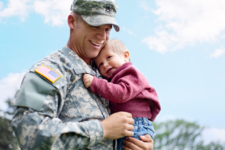 veteran and young baby